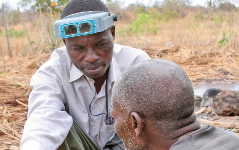 5597520009_b5d59e439e_o.jpg An eye care worker consulting with a patient in the community. TANZANIA. © Lance Bellers/Sight Savers