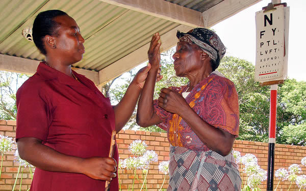 an-older-woman An older women has her vision tested. SWAZILAND. © Daisy Wilson