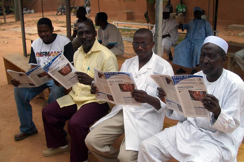 reading-the-french-edition2 Winner of the 2011 Community Eye Health Journal Photograph Competition: Four nurses reading the French edition of the journal. NIGER. © Andrew Potter.