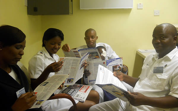 reading-the-journal-botswana Staff reading the Community Eye Health Journal. BOTSWANA. © Tatowela Mmoloki. 2nd place in the 2011 Community Eye Health Journal Photograph Competition